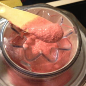churning strawberry yogurt